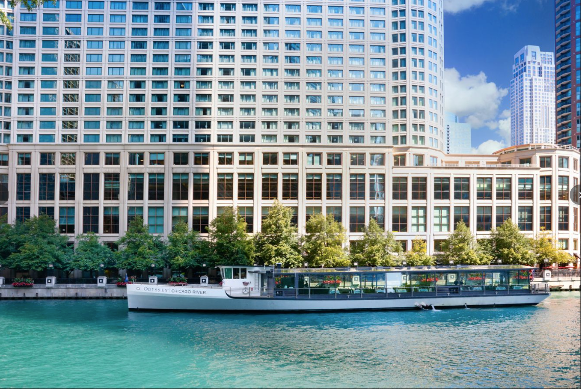 Odyssey Chicago River boat alongside the Sheraton Grand
